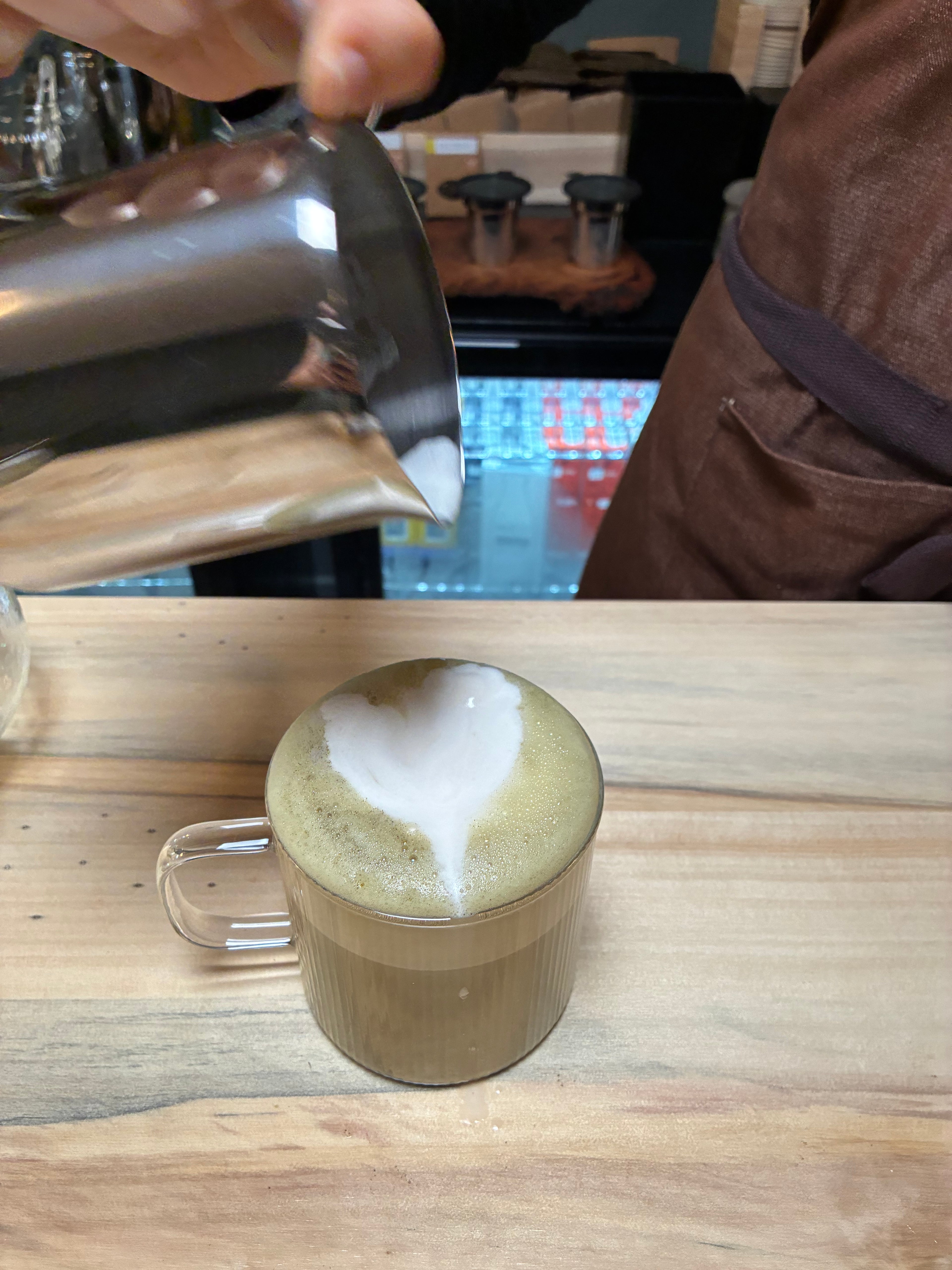 Hot chai in store served in glass mug